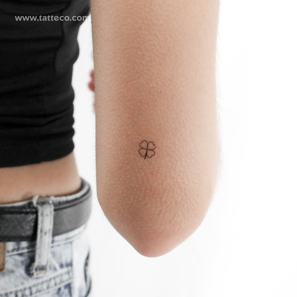 Small Black Four Leaf Clover Tattoo Idea