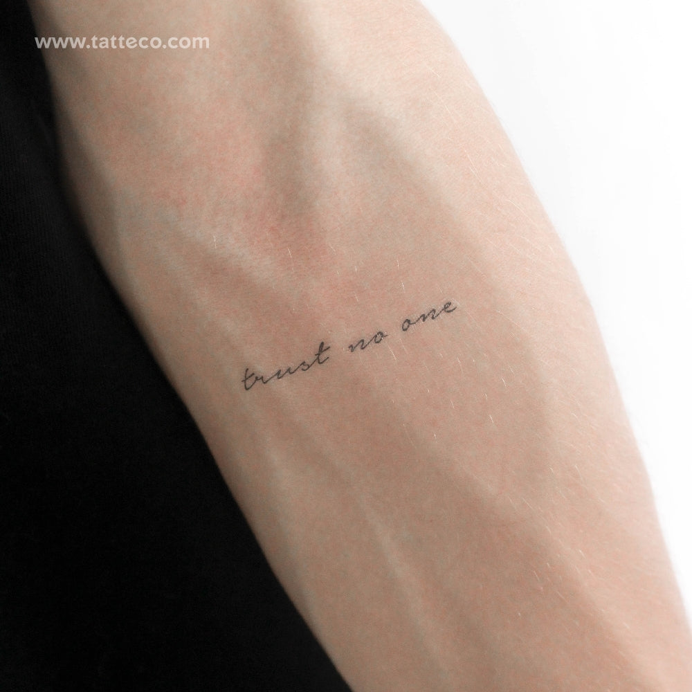 Female Trust No One Tattoo Meaning
