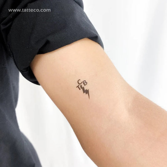 Music tattoos: Evlis Presley Tattoo Taking Care of Business Logo