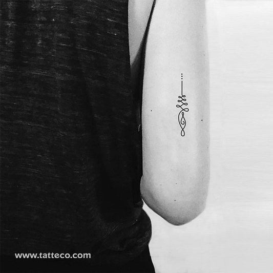 Understanding the Shared Symbolism of Om and Unalome Tattoos