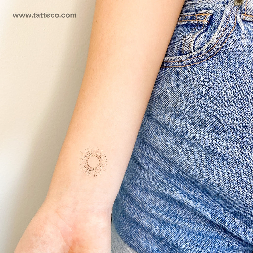 Tiny Sun Wrist Tattoo