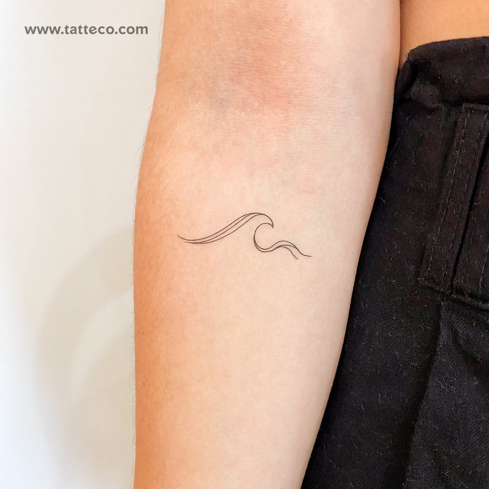 White Ink Wave Tattoo