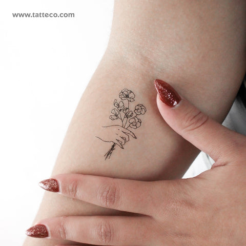 Small Hand Holding Flowers Temporary Tattoo - Set of 3