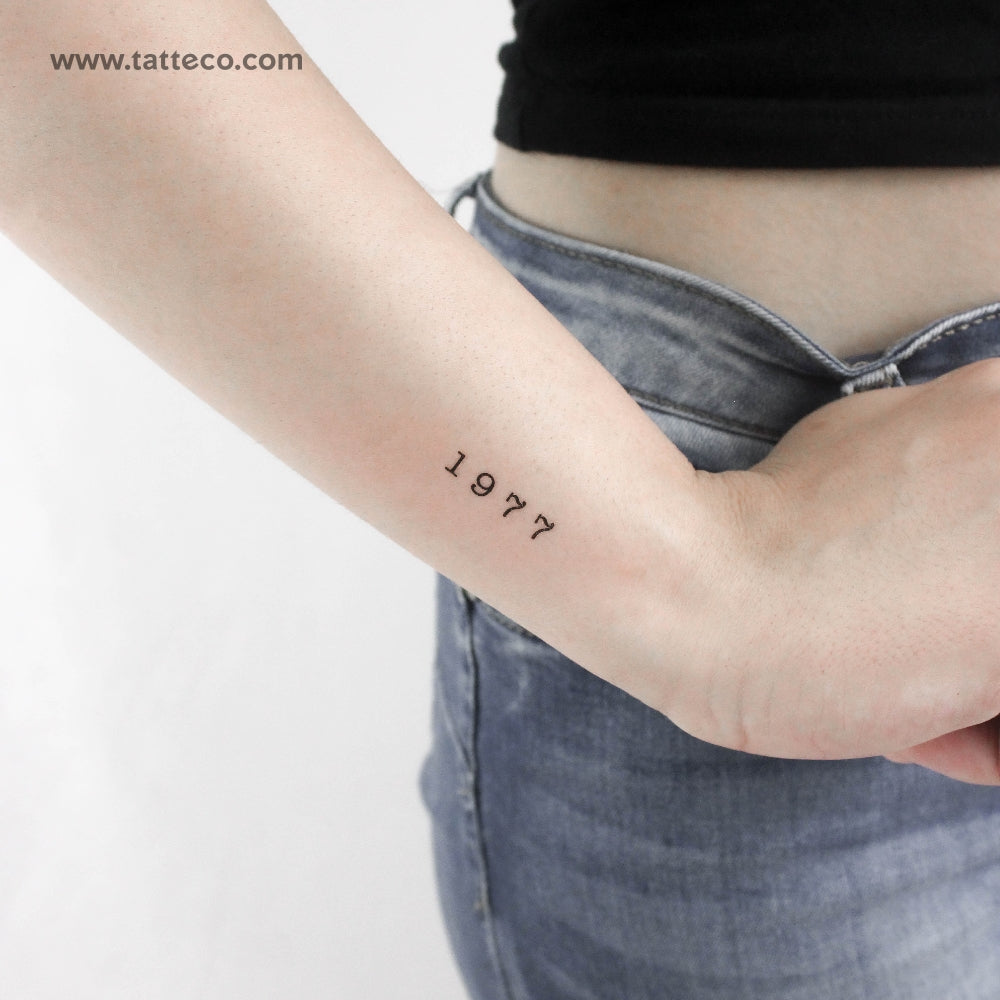 1977-roman-numerals-tattoo-bronctattooaus