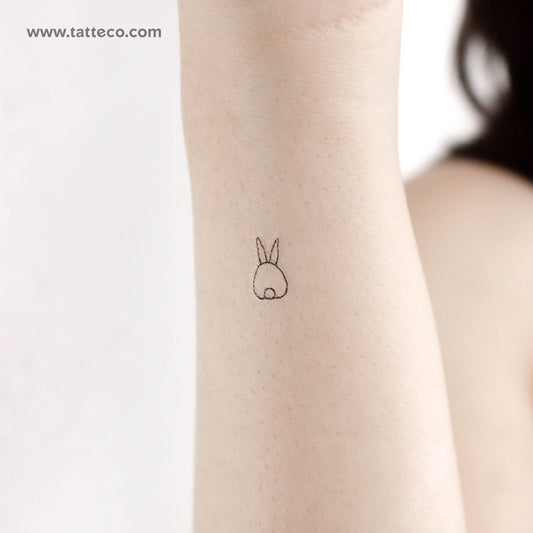 Tatuaje temporal de un pequeño conejo desde atrás (juego de 3)