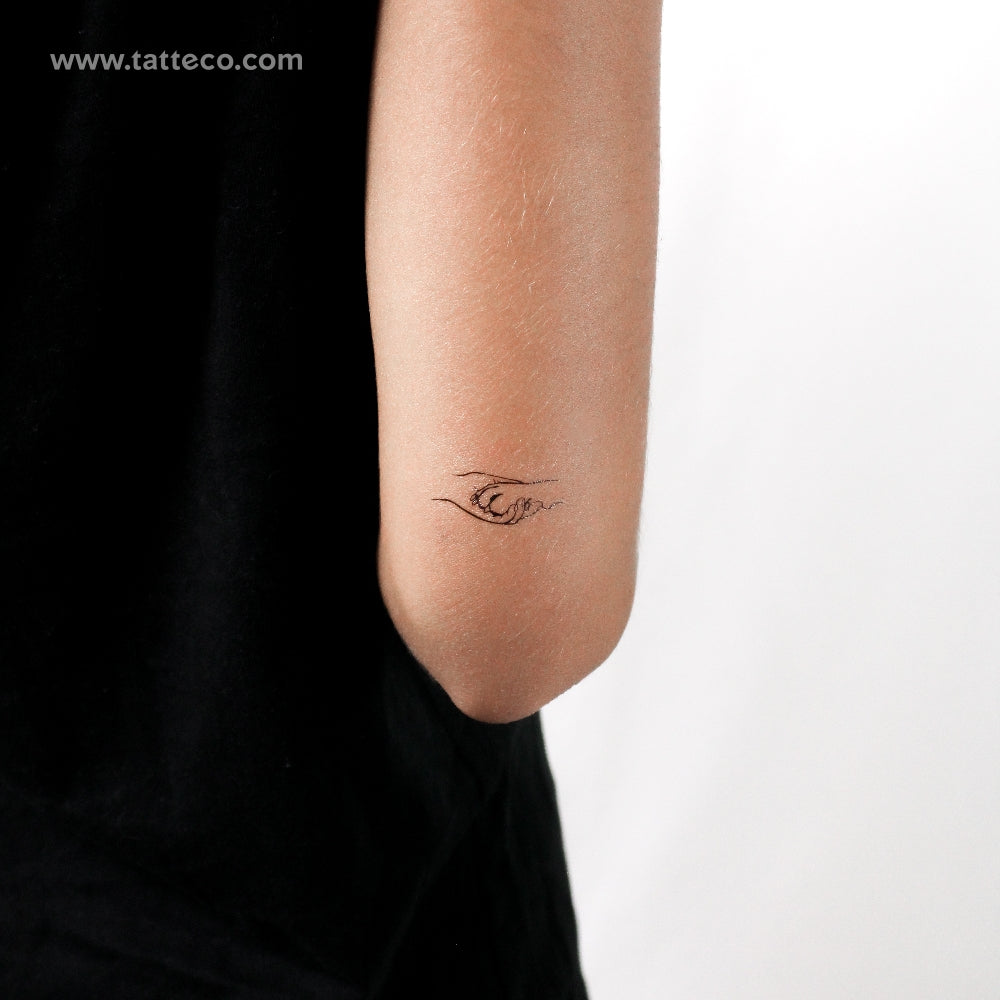 Tatuaje temporal de pata de perro y mano humana en forma de apretón de manos (juego de 3)