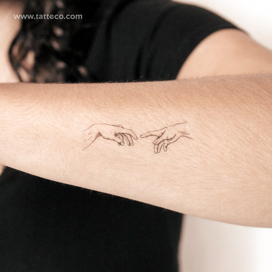 Tatuaje temporal de 2 semanas "Creation of Adam Hands" (juego de 2)